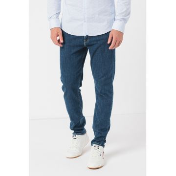 Blugi cu croiala conica si model uni