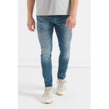 Blugi slim fit cu aspect decolorat Delano