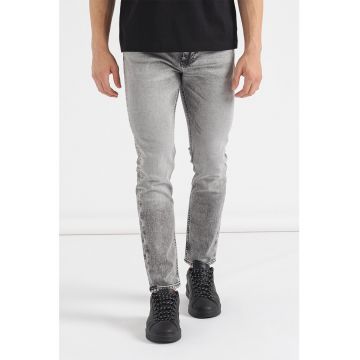 Blugi slim fit cu aspect decolorat Delano