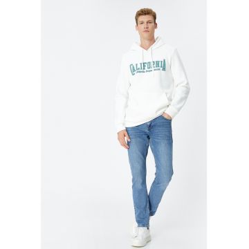 Blugi slim fit cu aspect decolorat Brad