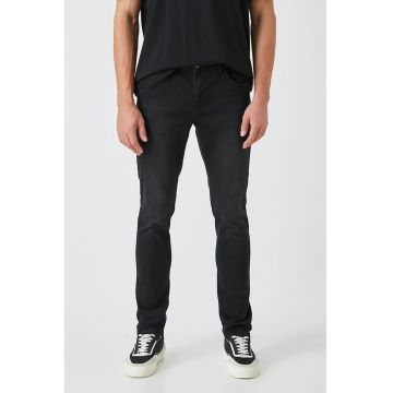Blugi slim fit cu talie joasa