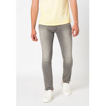 Blugi conici cu aspect decolorat