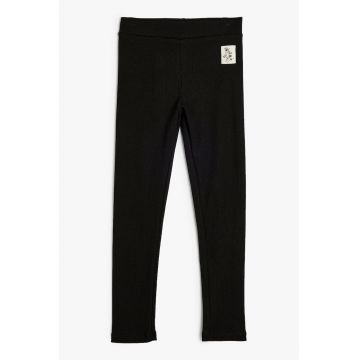 Pantaloni cu aspect striat