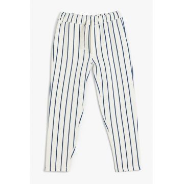 Pantaloni conici cu dungi