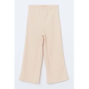 Pantaloni cu croiala ampla si talie elastica