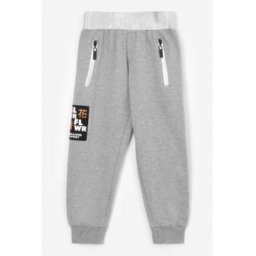 Pantaloni de trening cu buzunare cu fermoar