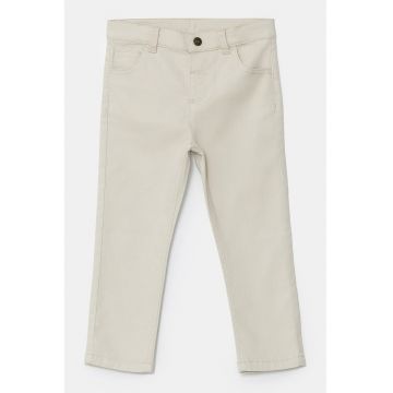 Pantaloni slim fit cu model uni