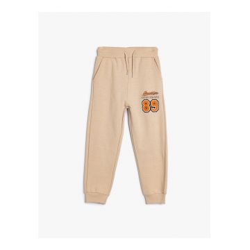 Pantaloni de trening cu buzunare laterale