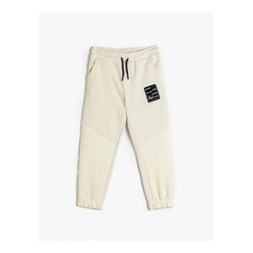 Pantaloni de trening cu buzunare laterale