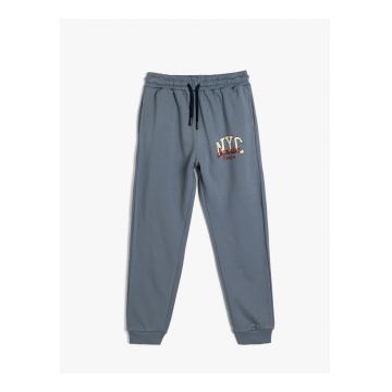 Pantaloni de trening cu snur de ajustare si buzunare laterale