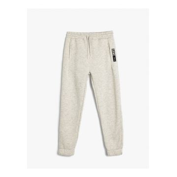 Pantaloni de trening uni cu snur