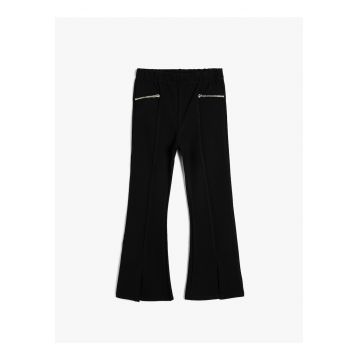 Pantaloni evazati cu model uni