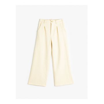 Pantaloni texturati cu croiala ampla