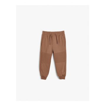 Pantaloni de trening relaxed fit cu buzunare laterale