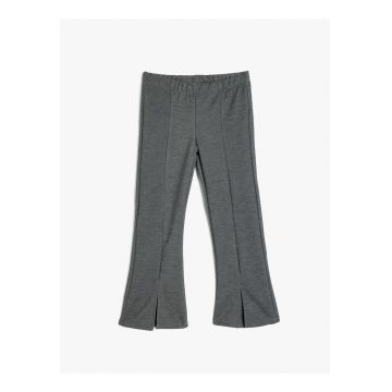 Pantaloni evazati cu slituri frontale