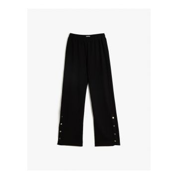 Pantaloni relaxed fit cu detalii cu capse
