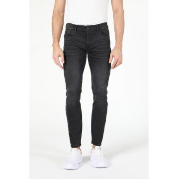 Blugi skinny cu aspect usor decolorat