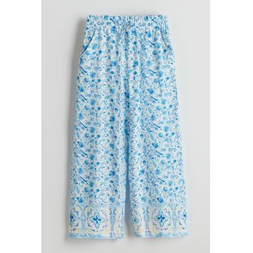 Pantaloni cu croiala ampla si imprimeu