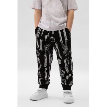 Pantaloni cu imprimeu si snururi de ajustare