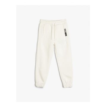 Pantaloni de trening uni cu snur