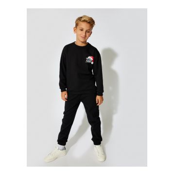 Pantaloni de trening uni cu talie ajustabila