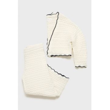 Pantaloni tricotati cu perforatii cu mansete valurite