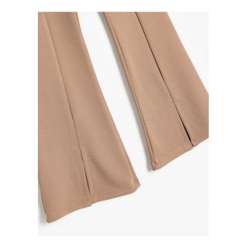 Colanti cu talie elastica si terminatii cu slituri