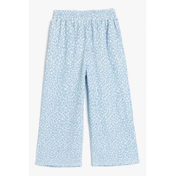 Pantaloni ampli cu imprimeu floral