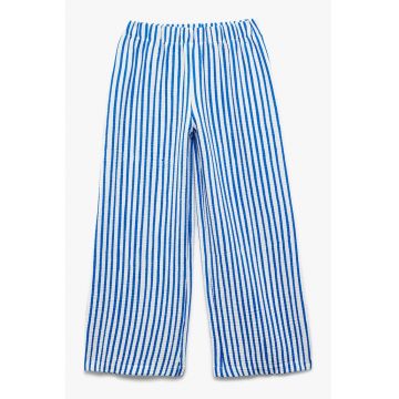 Pantaloni cu croiala ampla - model in dungi si talie elastica