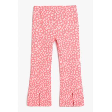 Pantaloni evazati cu model floral