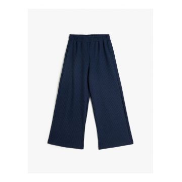 Pantaloni texturati cu croiala ampla si talie elastica