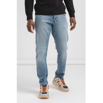 Blugi conici cu aspect decolorat