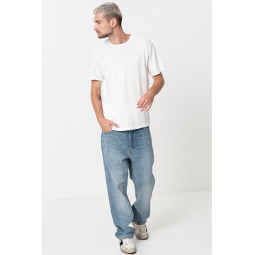Blugi relaxed fit cu aspect decolorat Nate