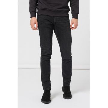 Blugi slim fit cu croiala conica