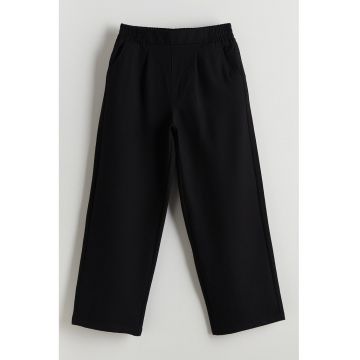 Pantaloni conici cu talie elastica