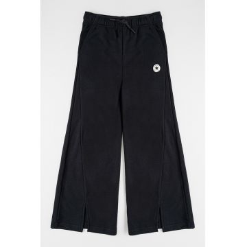 Pantaloni cu croiala ampla si slituri frontale si snur