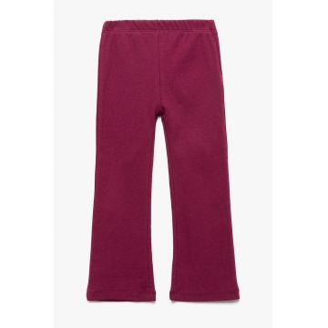 Pantaloni evazati cu model uni