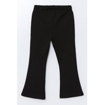 Pantaloni uni evazati