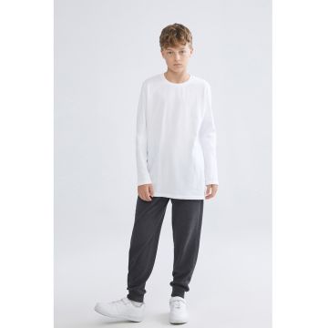 Pantaloni de trening din material pique cu model uni