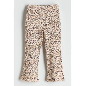 Pantaloni evazati cu model floral