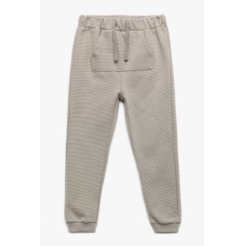 Pantaloni striati de trening cu buzunar
