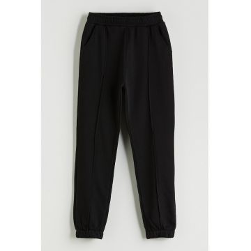 Pantaloni uni cu pensa