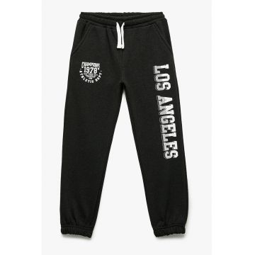 Pantaloni de trening cu imprimeu text