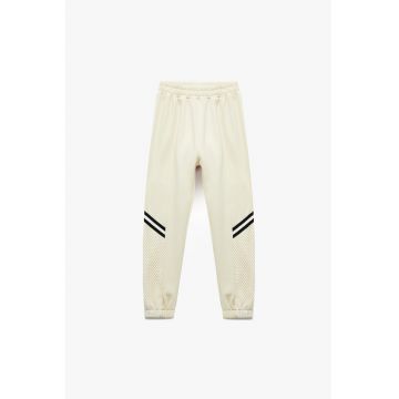 Pantaloni de trening cu segment din plasa