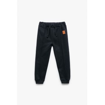 Pantaloni de trening din amestec de bumbac cu model uni