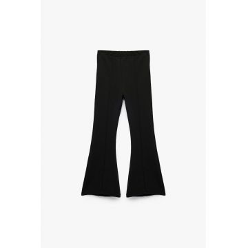 Pantaloni uni evazati