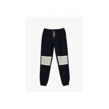 Pantaloni conici de trening - Bleumarin
