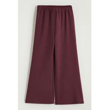 Pantaloni cu croiala ampla si talie elastica