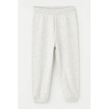 Pantaloni de trening cu terminatii elastice si model uni